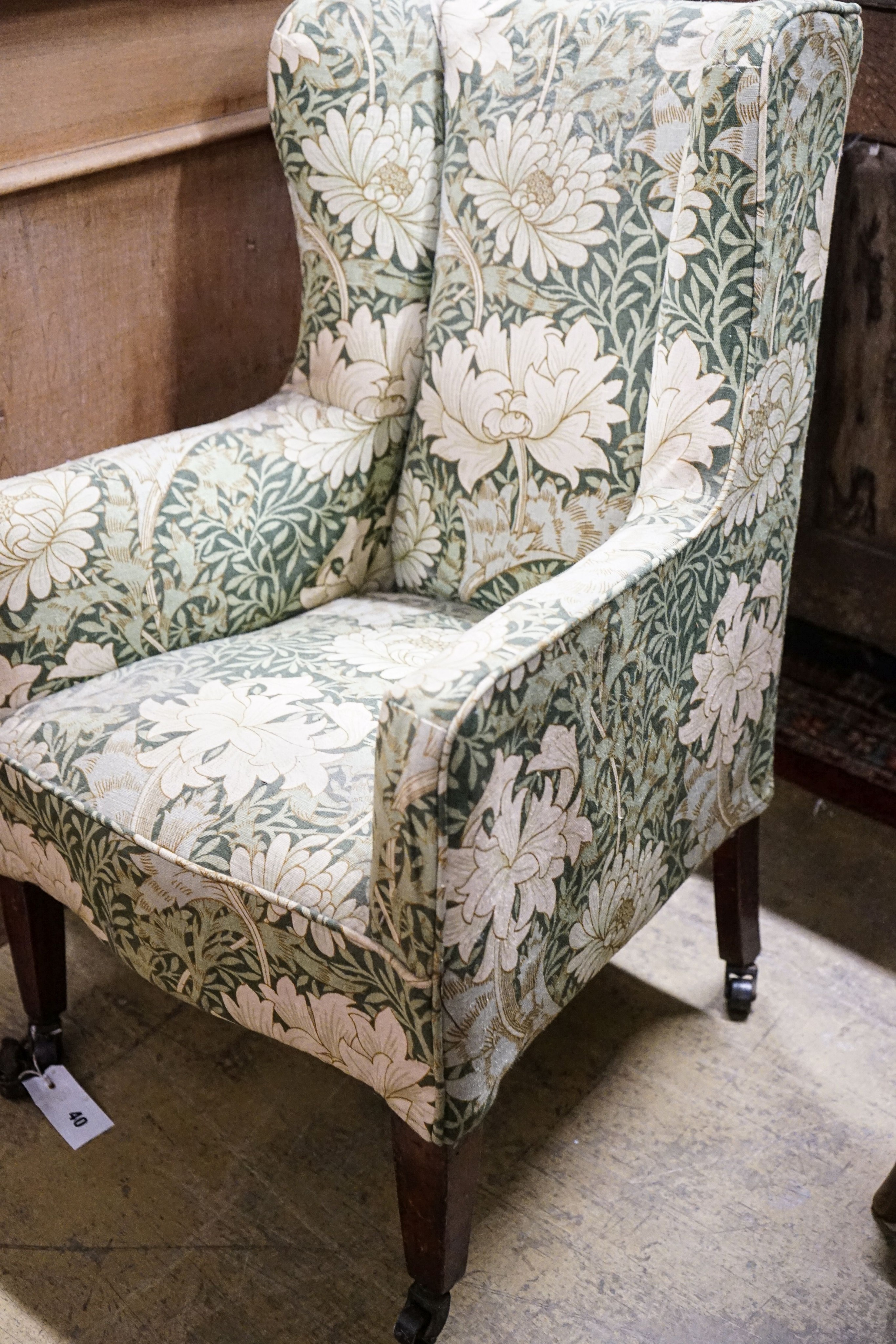 A George III mahogany child's armchair, with square tapered legs fitted brass castors, width 49cm, depth 48cm, height 78cm